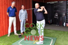 John McSweeney from McGuirks trys out the new custom fitting bay at Frankfield Golf Academy, watched by resident PGA professionals David Whyte and Michael Ryan. Picture: Niall O'Shea
