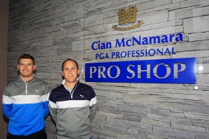 Shane Irwin pictured with Cian McNamara outside Monkstown Pro-Shop